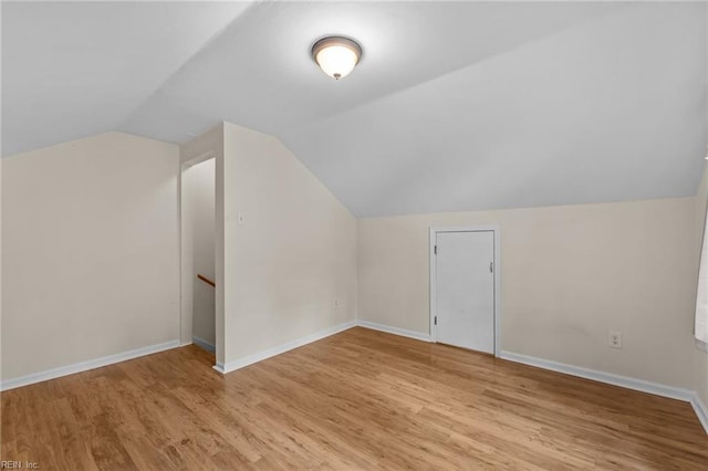 10 Kathy Dr, Poquoson, VA 23662 - additional living space with light wood-style floors, lofted ceiling, and baseboards