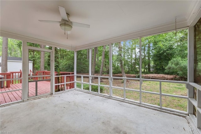 10 Kathy Dr, Poquoson, VA 23662 - unfurnished sunroom featuring a ceiling fan and view of scattered trees