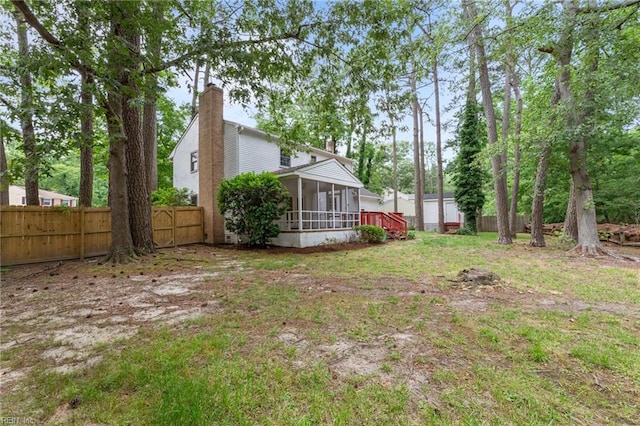 10 Kathy Dr, Poquoson, VA 23662 - fenced backyard with a sunroom