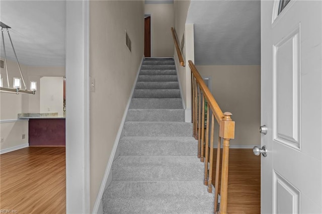 10 Kathy Dr, Poquoson, VA 23662 - stairs with wood finished floors and baseboards