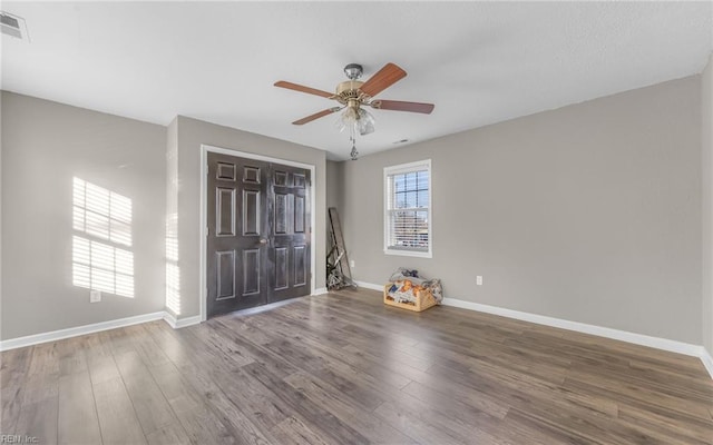 1215 W 27th St, Norfolk, VA 23508 - empty room featuring baseboards, a ceiling fan, and wood finished floors
