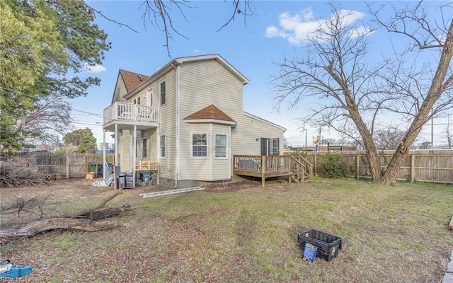 1215 W 27th St, Norfolk, VA 23508 - back of property featuring a balcony and a deck