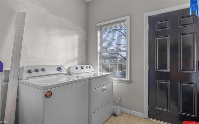 1215 W 27th St, Norfolk, VA 23508 - washroom featuring independent washer and dryer, light tile patterned floors, and baseboards