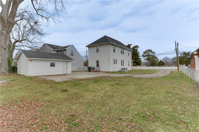 1108 E Pembroke Ave, Hampton, VA 23669 - back of property featuring a patio area, an outbuilding, and central AC