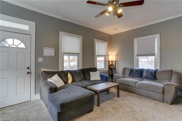 1108 E Pembroke Ave, Hampton, VA 23669 - living area with light colored carpet, ceiling fan, plenty of natural light, and ornamental molding