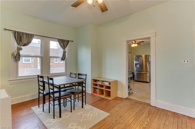 1108 E Pembroke Ave, Hampton, VA 23669 - dining room with a ceiling fan, wood-type flooring, baseboards, and plenty of natural light