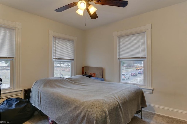 1108 E Pembroke Ave, Hampton, VA 23669 - bedroom with carpet floors, baseboards, and a ceiling fan