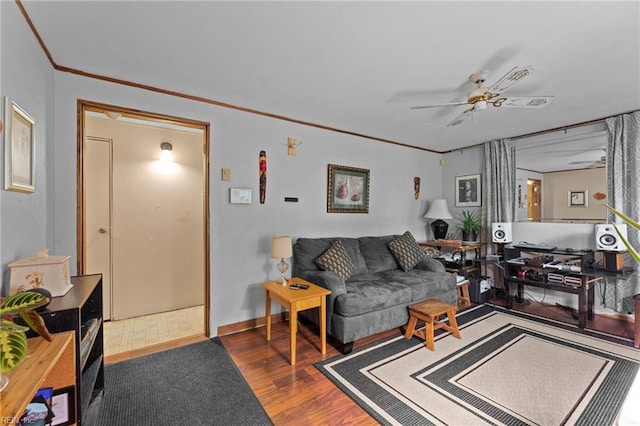 4420 Anderson Ave, Suffolk, VA 23435 - living room with wood finished floors, ornamental molding, baseboards, and a ceiling fan