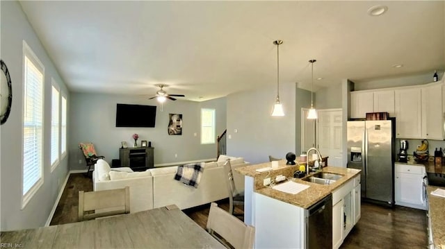 228 Bethune Dr, Williamsburg, VA 23185 - kitchen with stainless steel fridge with ice dispenser, a sink, plenty of natural light, white cabinets, and recessed lighting