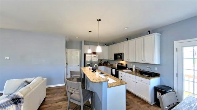 228 Bethune Dr, Williamsburg, VA 23185 - kitchen featuring electric range oven, stainless steel fridge with ice dispenser, a sink, and white cabinets