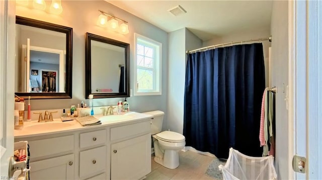 228 Bethune Dr, Williamsburg, VA 23185 - bathroom with toilet, double vanity, and a shower with curtain