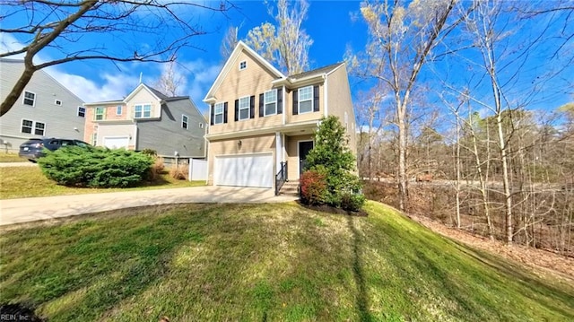 228 Bethune Dr, Williamsburg, VA 23185 - view of front of home featuring a garage, driveway, and a front lawn