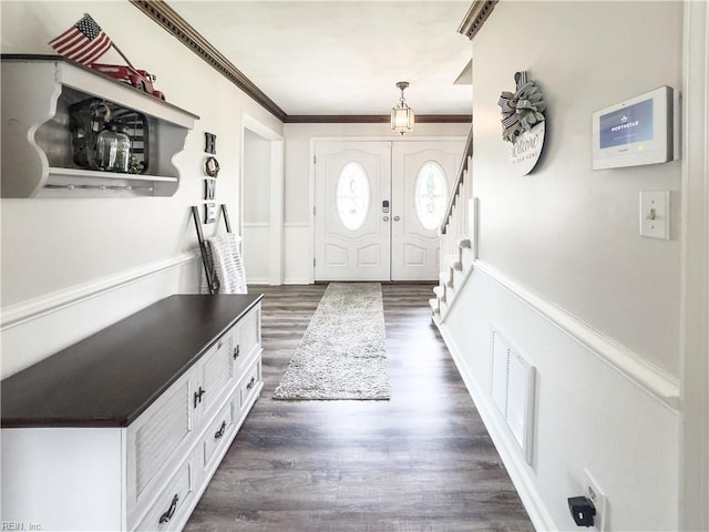 4657 Revere Dr, Virginia Beach, VA 23456 - entryway featuring dark wood finished floors, stairway, and ornamental molding
