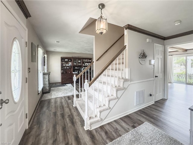 4657 Revere Dr, Virginia Beach, VA 23456 - foyer with stairway, dark wood-type flooring, baseboards, and crown molding