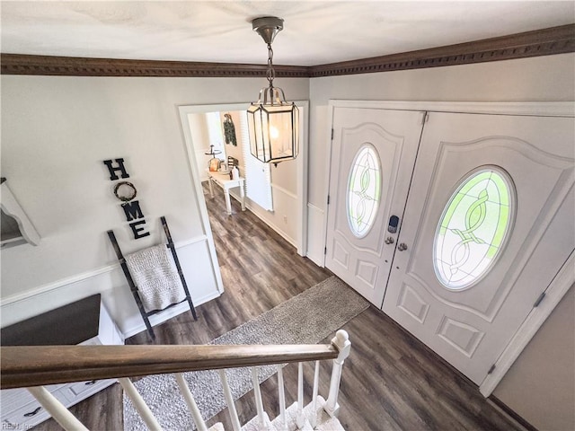 4657 Revere Dr, Virginia Beach, VA 23456 - foyer with dark wood-type flooring, a chandelier, baseboards, and ornamental molding