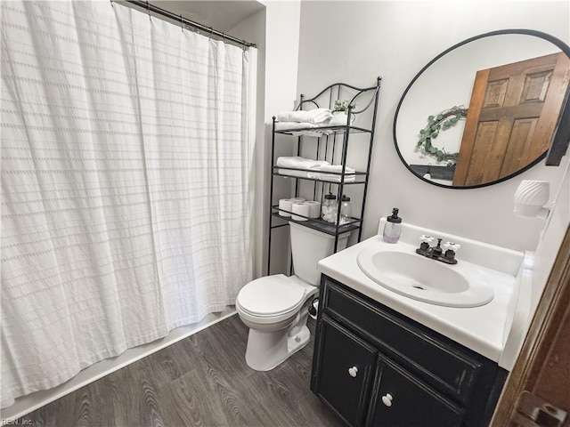 4657 Revere Dr, Virginia Beach, VA 23456 - full bathroom featuring toilet, wood finished floors, and vanity