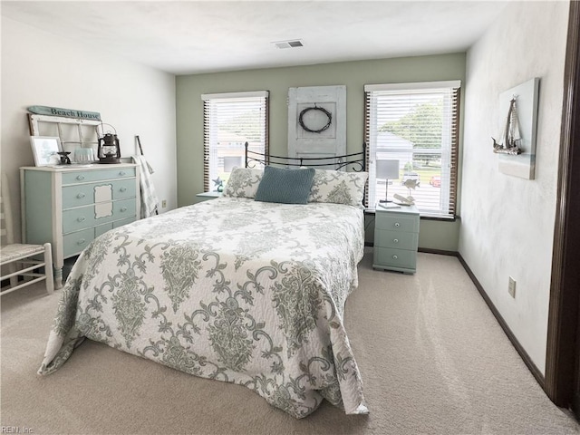 4657 Revere Dr, Virginia Beach, VA 23456 - bedroom featuring light colored carpet and baseboards