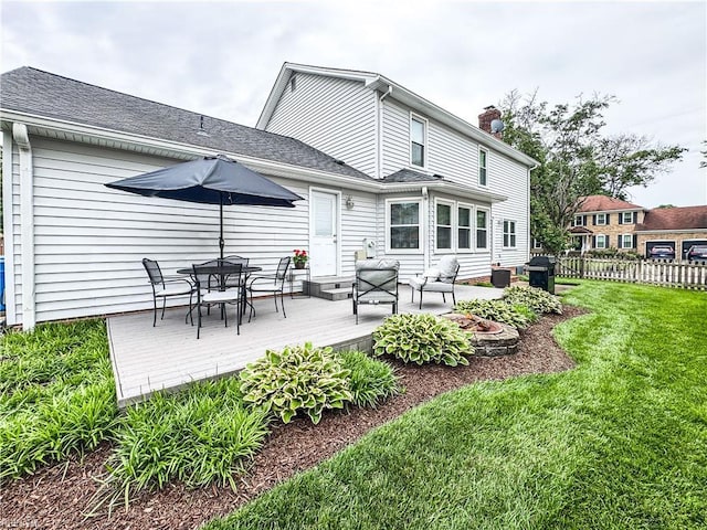 4657 Revere Dr, Virginia Beach, VA 23456 - back of house with a wooden deck, outdoor dining space, and a chimney