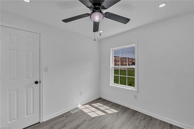 1604 Freeney Ave, Suffolk, VA 23434 - empty room with baseboards, wood finished floors, recessed lighting, and ceiling fan