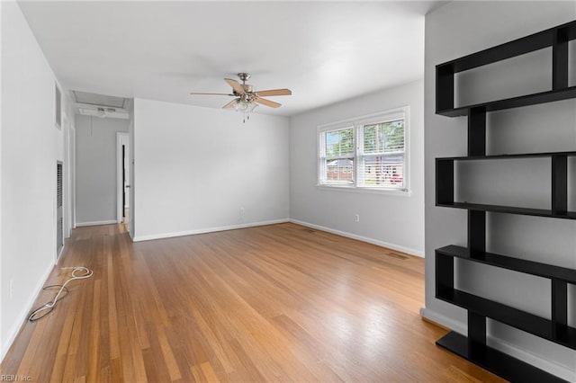 617 Redheart Dr, Hampton, VA 23666 - unfurnished living room featuring a ceiling fan, attic access, and wood finished floors