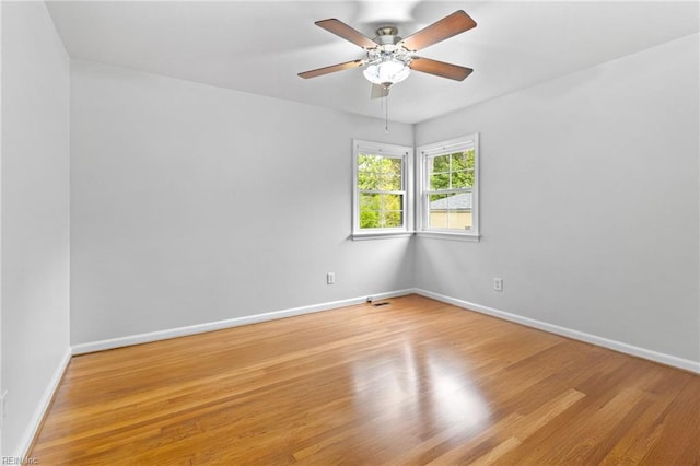 617 Redheart Dr, Hampton, VA 23666 - empty room with a ceiling fan and wood finished floors
