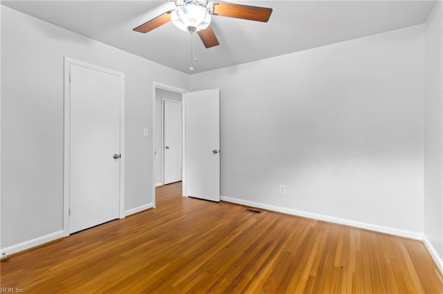 617 Redheart Dr, Hampton, VA 23666 - unfurnished bedroom with wood finished floors and ceiling fan