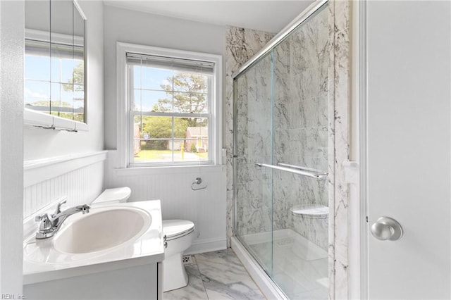 617 Redheart Dr, Hampton, VA 23666 - full bathroom with marble look tile flooring, vanity, a marble finish shower, and a wainscoted wall
