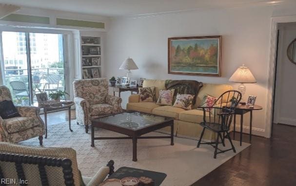 3810 Atlantic Ave Unit 304, Virginia Beach, VA 23451 - living room featuring crown molding and wood finished floors