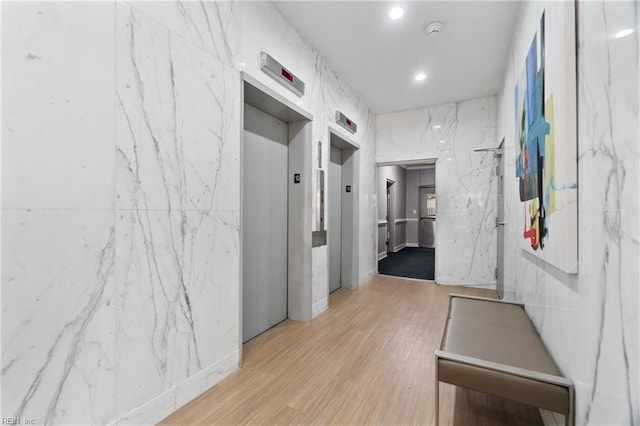 3810 Atlantic Ave Unit 304, Virginia Beach, VA 23451 - corridor with wood finished floors, recessed lighting, and elevator