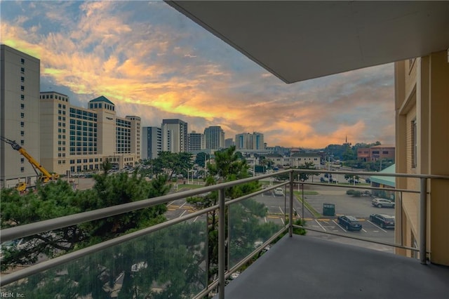 3810 Atlantic Ave Unit 304, Virginia Beach, VA 23451 - balcony at dusk featuring a city view