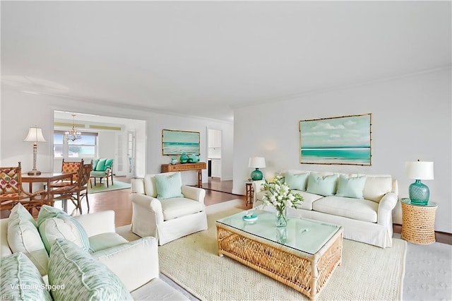 3810 Atlantic Ave Unit 304, Virginia Beach, VA 23451 - living room with crown molding and a chandelier