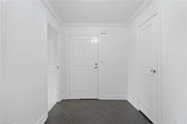 3810 Atlantic Ave Unit 304, Virginia Beach, VA 23451 - doorway with dark tile patterned floors, baseboards, and ornamental molding