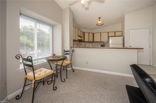 410 Babbling Brook Dr, Virginia Beach, VA 23462 - dining room with lofted ceiling, light colored carpet, a ceiling fan, and baseboards