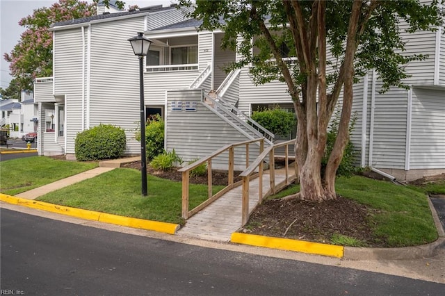 410 Babbling Brook Dr, Virginia Beach, VA 23462 - view of front of property with stairs, a front yard, and a chimney