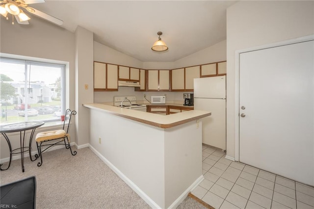 410 Babbling Brook Dr, Virginia Beach, VA 23462 - kitchen with white appliances, under cabinet range hood, light brown cabinetry, lofted ceiling, and a peninsula