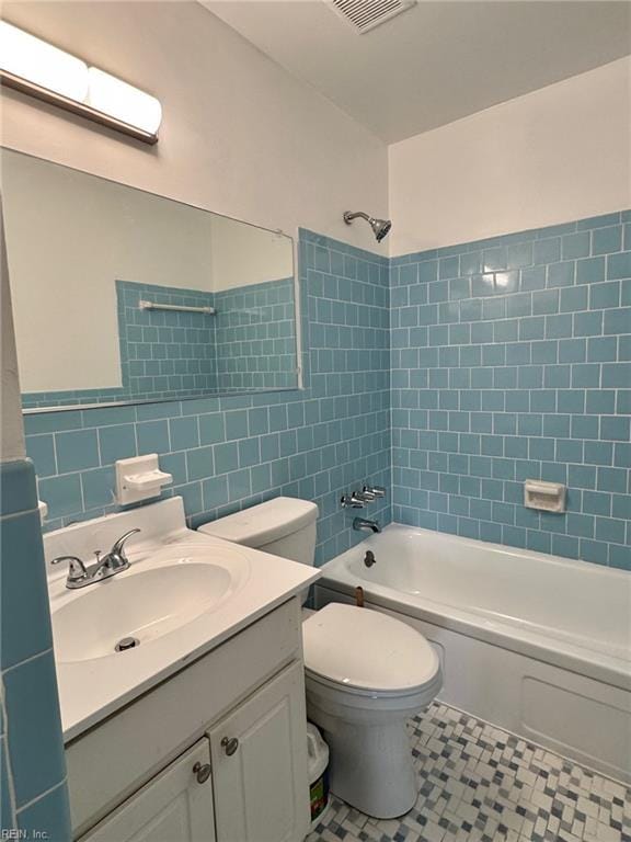 2 Yulee Ct, Hampton, VA 23669 - full bathroom with vanity, bathtub / shower combination, toilet, and tile walls