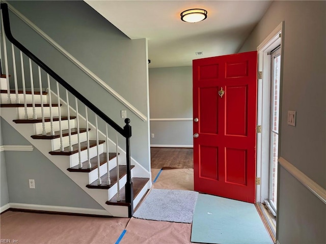 2 Yulee Ct, Hampton, VA 23669 - carpeted foyer entrance featuring stairs and baseboards
