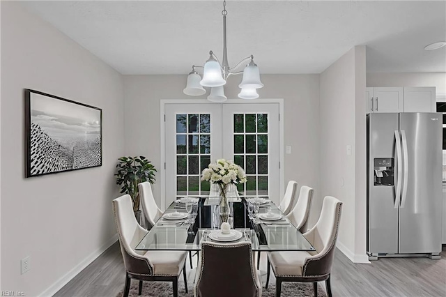 608 N Pine Grove Rd, Virginia Beach, VA 23452 - dining space featuring light wood-type flooring, a chandelier, and baseboards