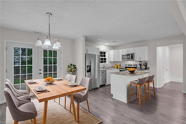 608 N Pine Grove Rd, Virginia Beach, VA 23452 - dining room with dark wood-style flooring, baseboards, a chandelier, french doors, and recessed lighting
