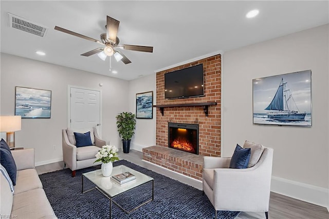 608 N Pine Grove Rd, Virginia Beach, VA 23452 - living room featuring wood finished floors, a ceiling fan, a brick fireplace, baseboards, and recessed lighting