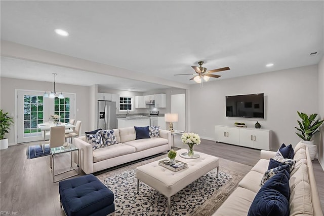 608 N Pine Grove Rd, Virginia Beach, VA 23452 - living room with light wood finished floors, baseboards, ceiling fan, and recessed lighting