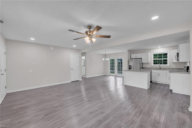 608 N Pine Grove Rd, Virginia Beach, VA 23452 - unfurnished living room with ceiling fan, a sink, baseboards, wood finished floors, and recessed lighting