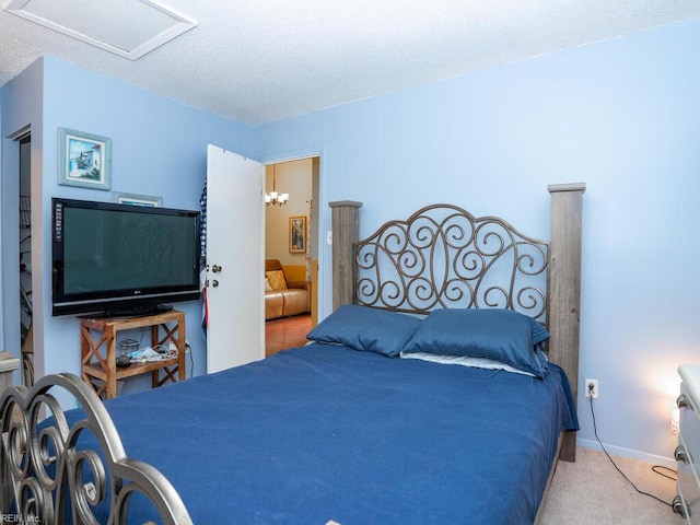 808 Dora Ct, Virginia Beach, VA 23455 - bedroom with carpet, a textured ceiling, and ensuite bathroom