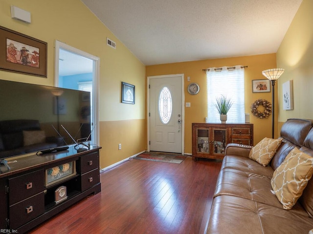 808 Dora Ct, Virginia Beach, VA 23455 - living room featuring dark wood-style flooring, lofted ceiling, and baseboards