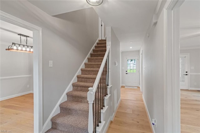 1756 Tyndall Point Rd, Gloucester Point, VA 23062 - stairs featuring wood finished floors and baseboards