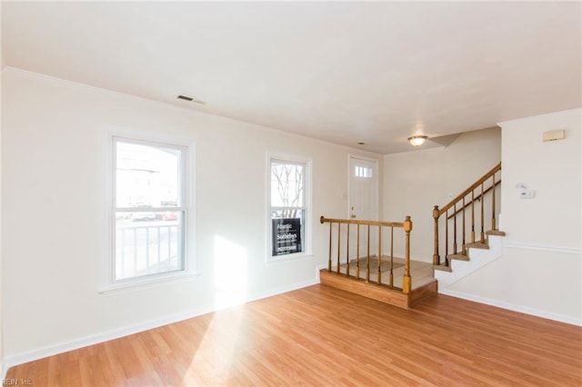 1582 Sword Dancer Dr, Virginia Beach, VA 23454 - foyer with light wood-type flooring, stairway, baseboards, and ornamental molding