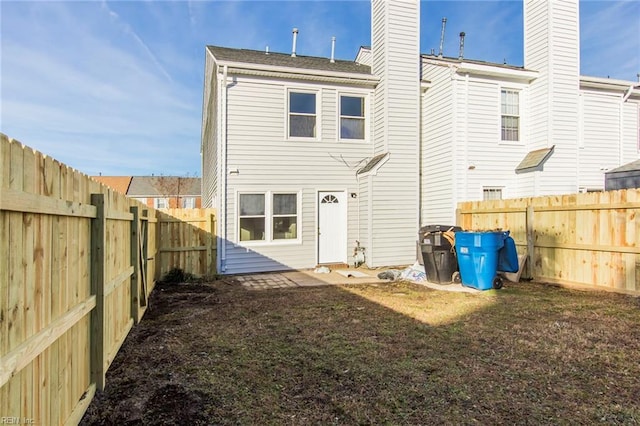 1582 Sword Dancer Dr, Virginia Beach, VA 23454 - rear view of property featuring a chimney and a fenced backyard