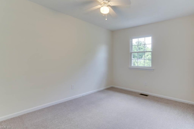 1603 Skiffes Creek Cir, Williamsburg, VA 23185 - empty room with light carpet, baseboards, and ceiling fan