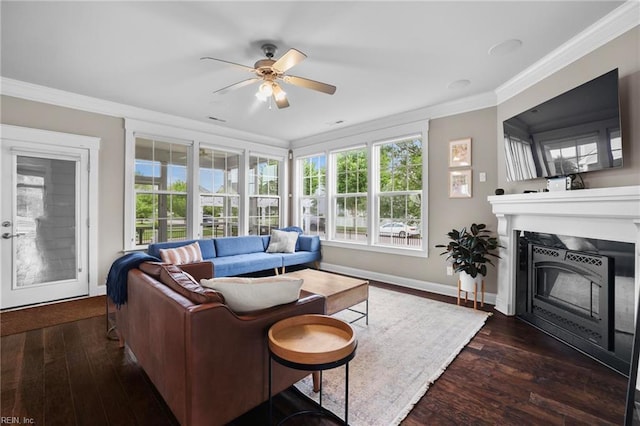 624 Mill Creek Pkwy, Chesapeake, VA 23323 - living area featuring a ceiling fan, crown molding, wood-type flooring, a glass covered fireplace, and baseboards