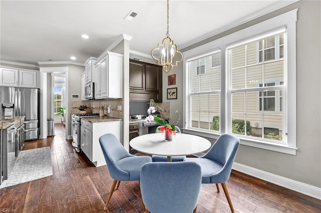 624 Mill Creek Pkwy, Chesapeake, VA 23323 - dining space with ornamental molding, a chandelier, baseboards, dark wood-style floors, and recessed lighting